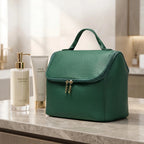 Green makeup bag on a bathroom counter with skincare products