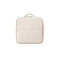 A cream-colored faux leather travel pouch with a top handle, shown from a front-facing perspective on a solid white background.