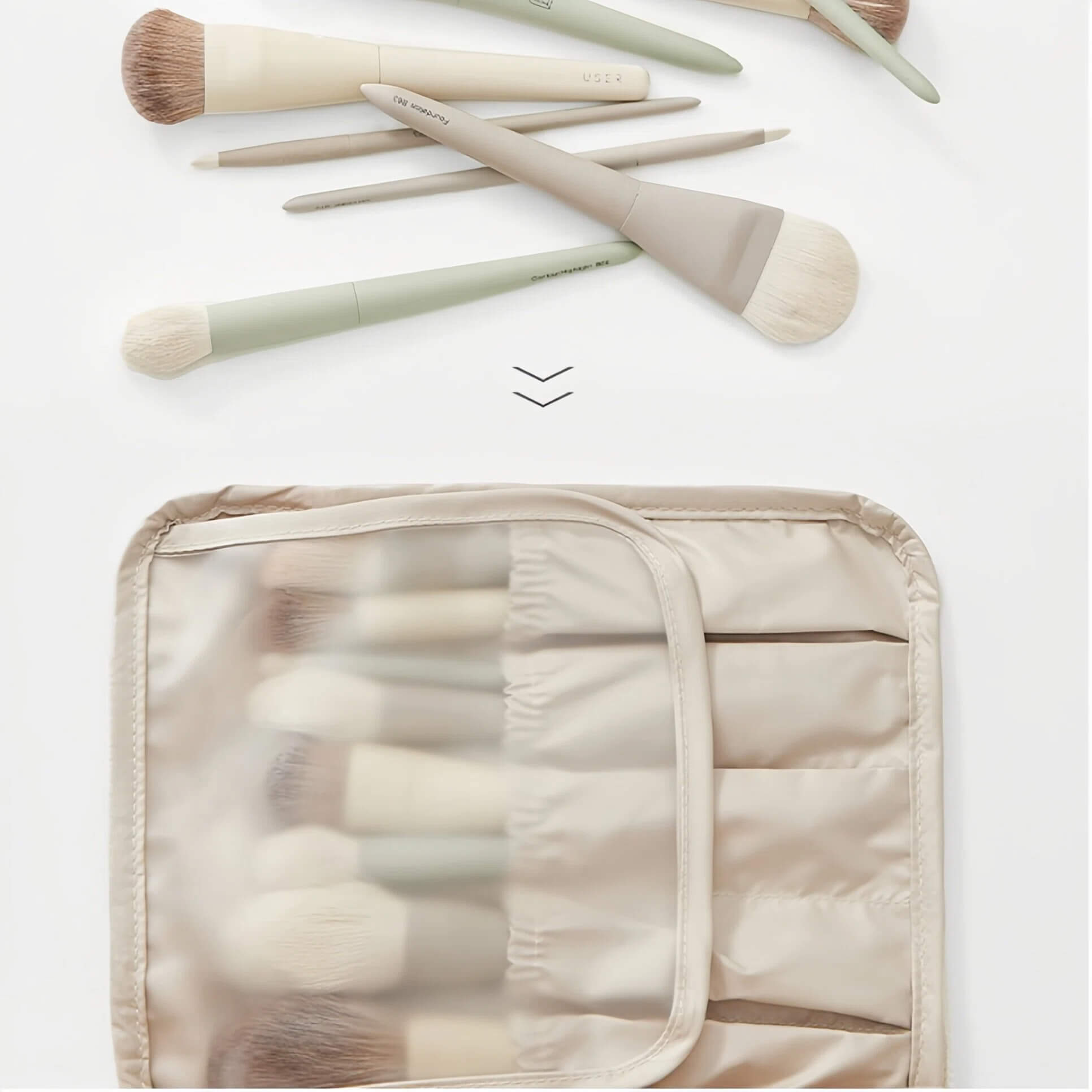 Makeup brushes with a clear pouch on a light background