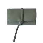 Olive green leather jewellery bag on a white background