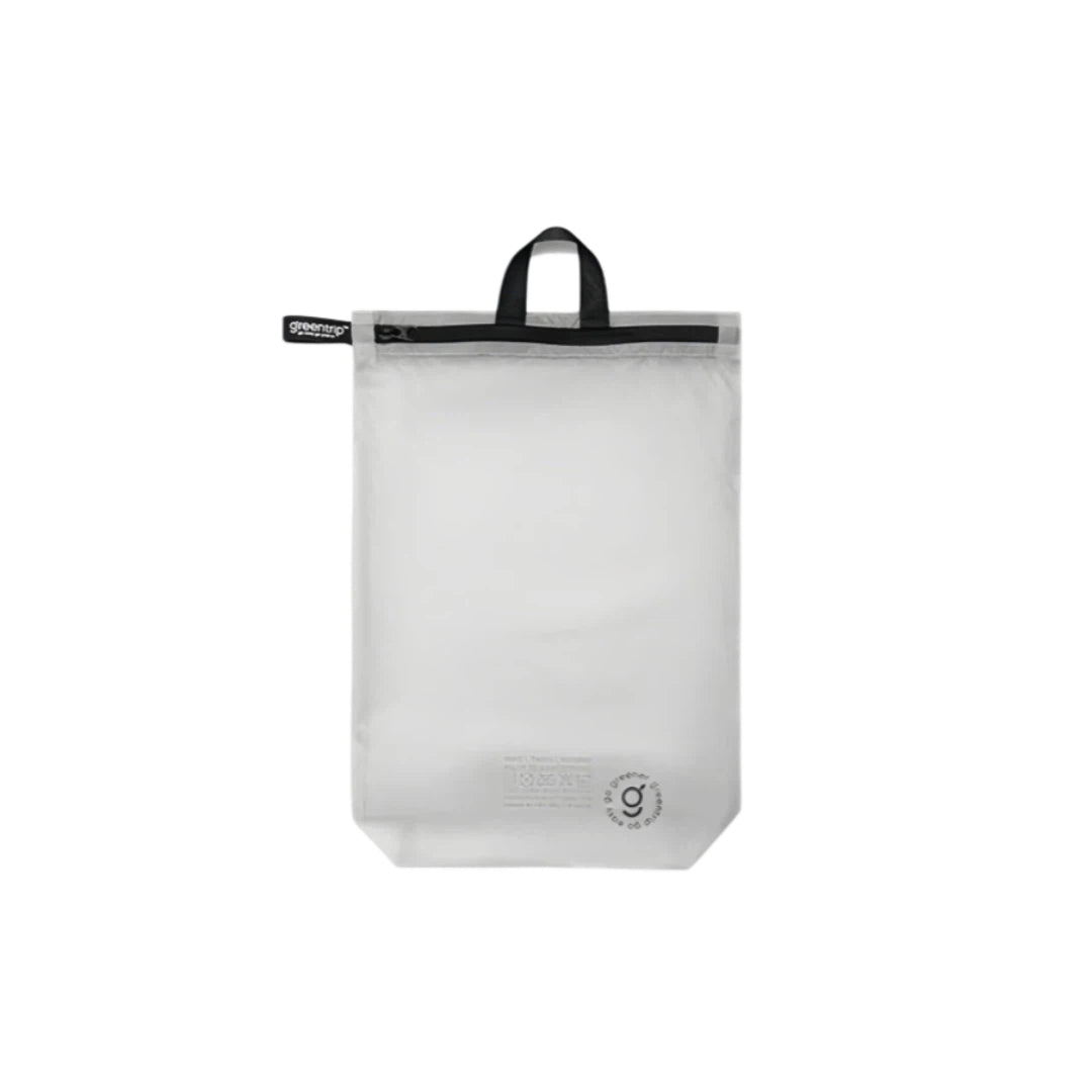 Grey travel bag with black handle on a white background