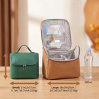 Two makeup bags, one green and one brown, with measurements and a water bottle on a wooden surface.