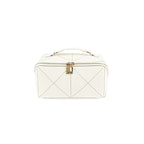 White cosmetic bag with gold accents on a white background