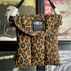 Gesteppte Laptoptasche mit Leopardenmuster