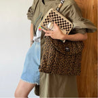 Gesteppte Laptoptasche mit Leopardenmuster