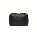 A black cosmetic pouch shown against a plain white background.