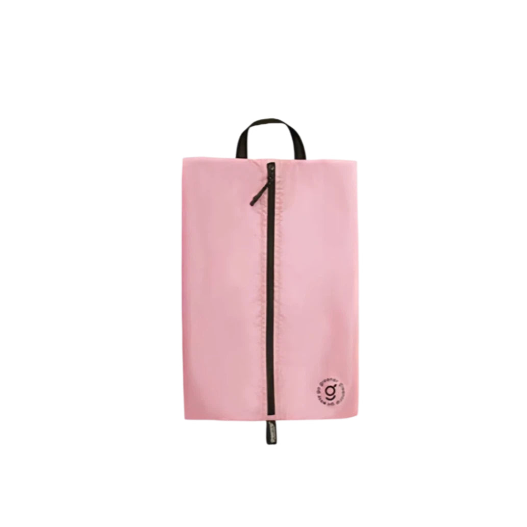 Pink shoe bag with a black zipper on a white background