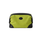 A lime green and black zippered cosmetic pouch with a black leather logo medallion on the front, set against a plain white background.
