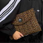 Gesteppte Laptoptasche mit Leopardenmuster