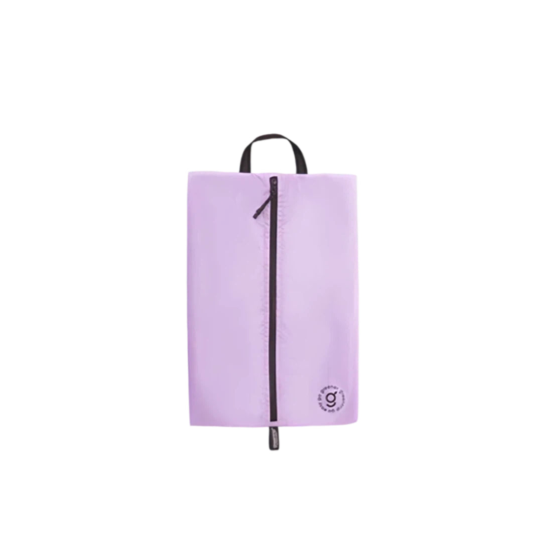 Purple shoe bag with a black zipper on a white background