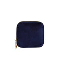 Navy blue velvet jewellery pouch with gold zipper on a white background