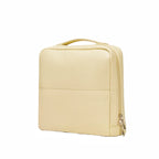 Yellow slim makeup bag on a white background
