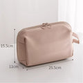 Beige makeup bag with dimensions on a light background
