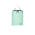 Light green travel bag with black zipper on a white background