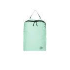 Light green travel bag with black zipper on a white background