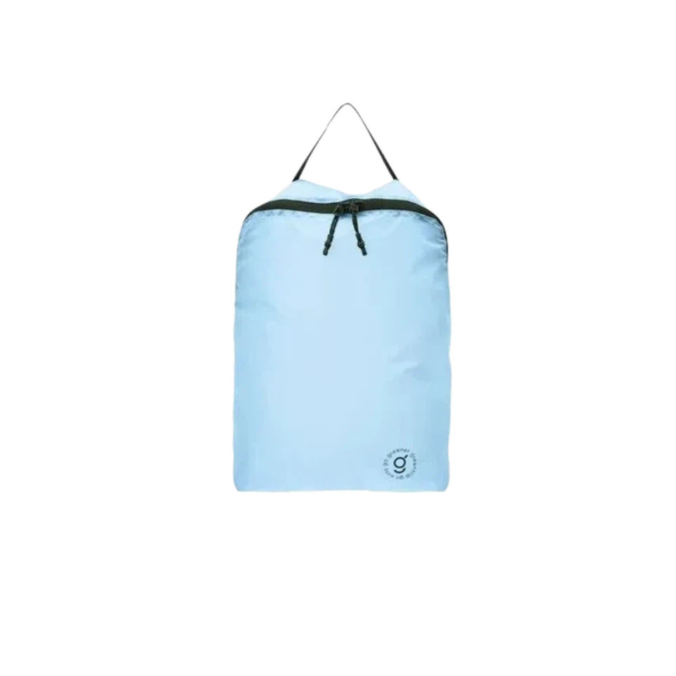 Light blue travel bag with black zipper on a white background