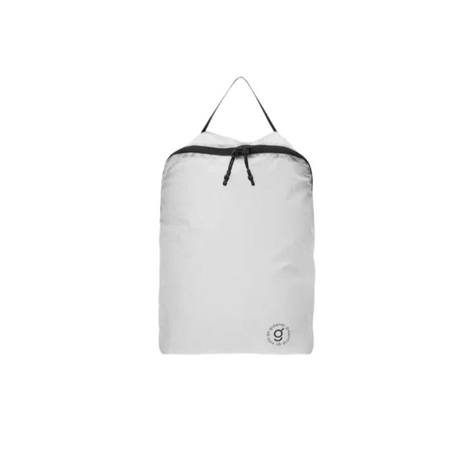 Grey travel bag with black zipper on a white background