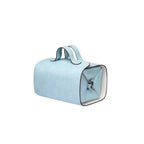 Light blue makeup bag with a handle on a white background