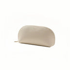Beige cosmetic pouch with a zipper on a white background