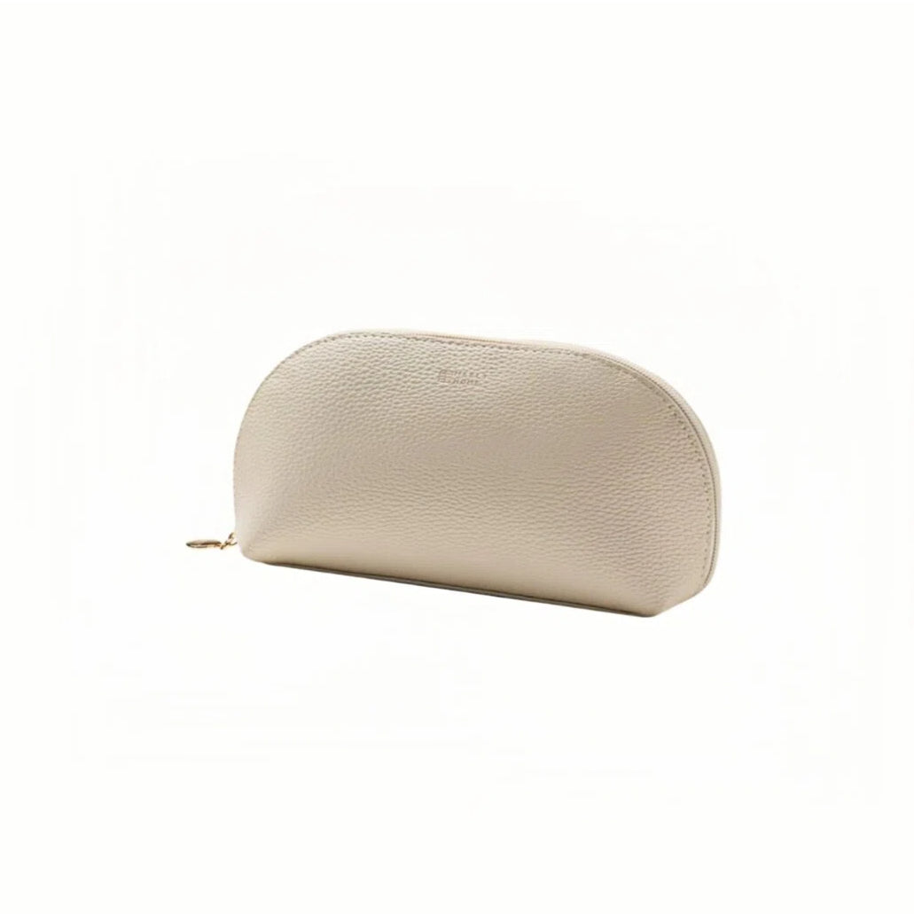 Beige cosmetic pouch with a zipper on a white background