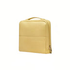 Yellow makeup bag on a white background