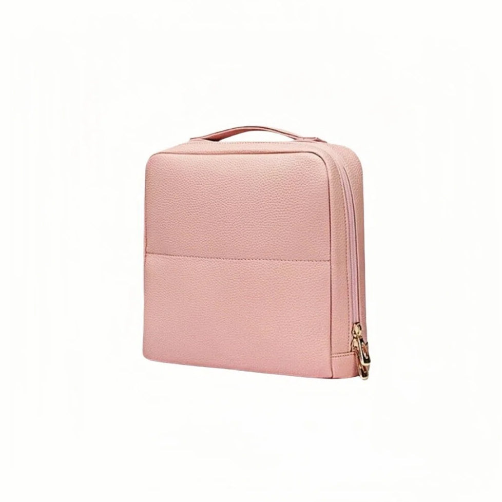 Pink mkeup bag with a zipper on a white background