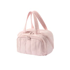 Pink travel bag with a strap on a white background