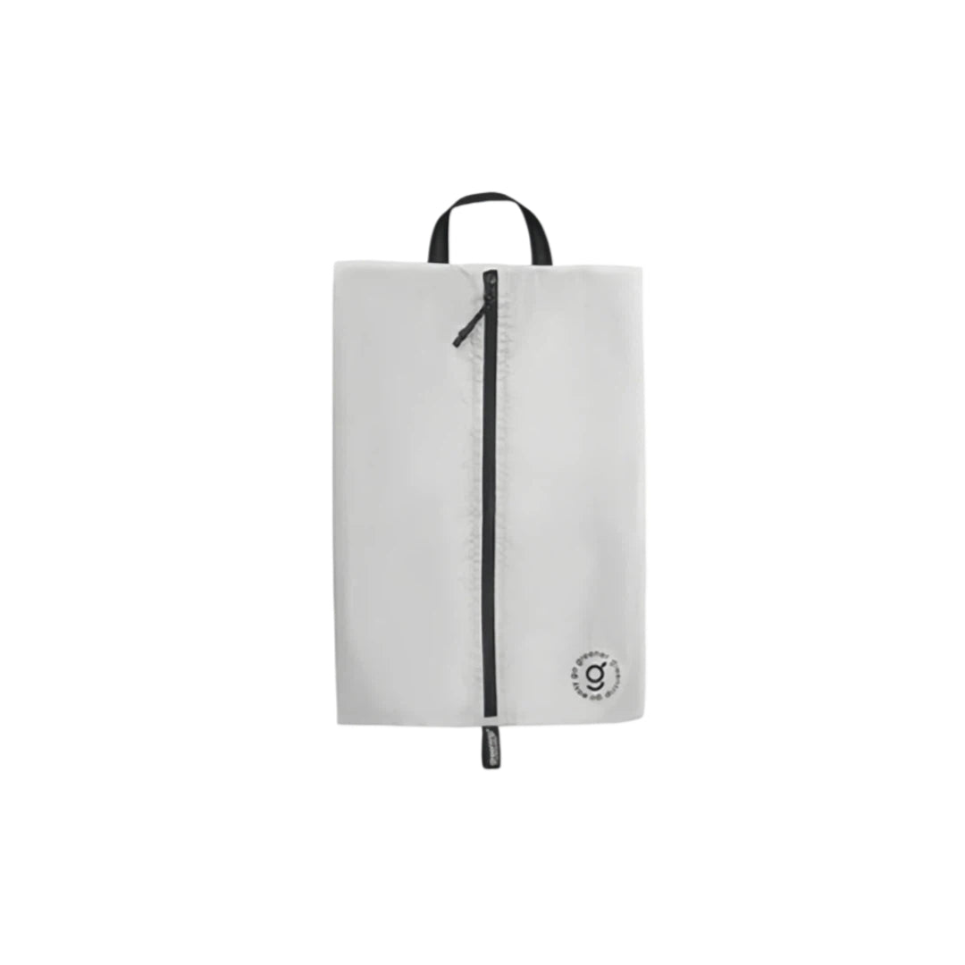 Grey shoe bag with a black zipper on a white background