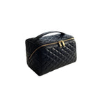 Black cosmetic bag with gold zipper on a white background