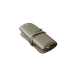 Olive grey leather case on a white background