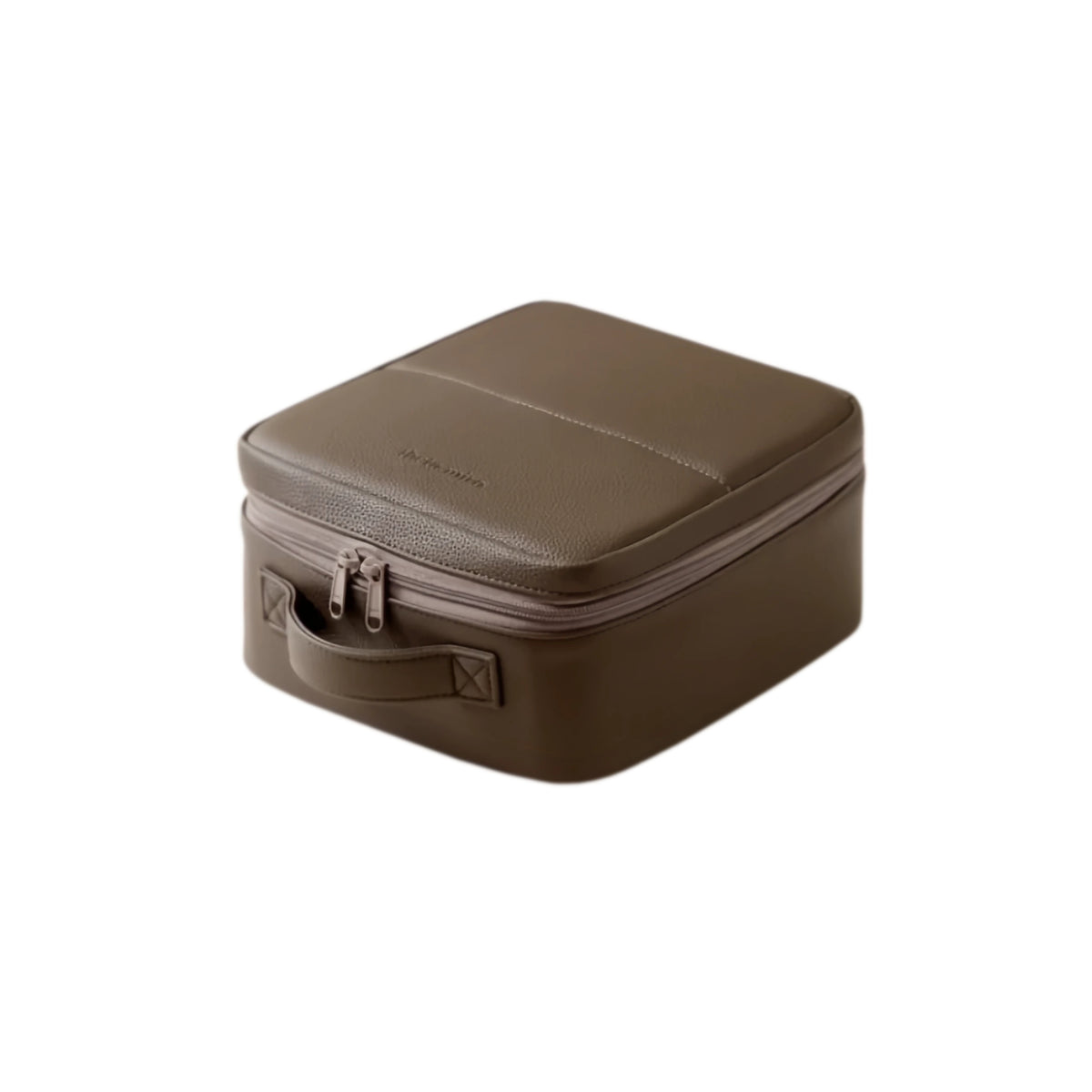 A brown textured leather travel case with a zippered closure and top handle, shown on a plain white background.